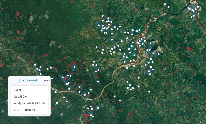 Satellite map interface showing a green forest landscape marked with numerous white dots and some red and blue areas, with a download menu open in the bottom-left corner that lists several file formats including Excel, GeoJSON, and EUDR Traces NT.